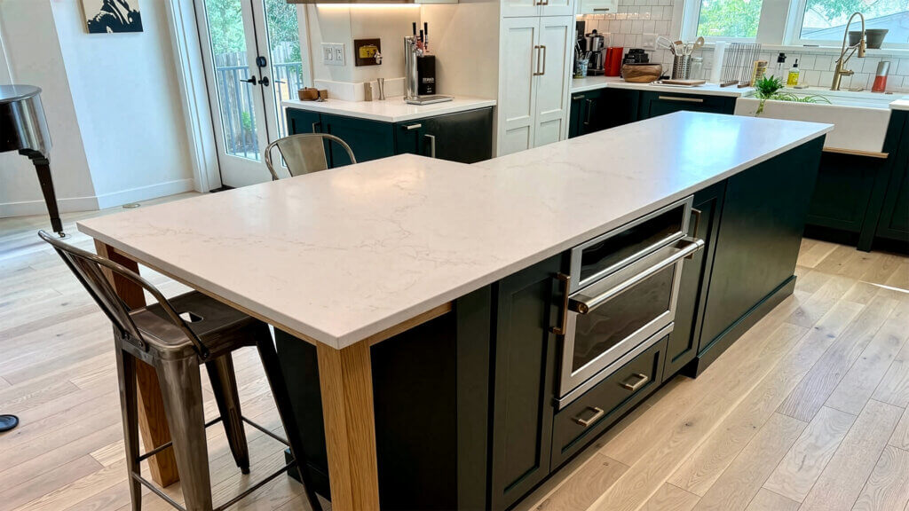 A closeup shot of white quartz kitchen counters